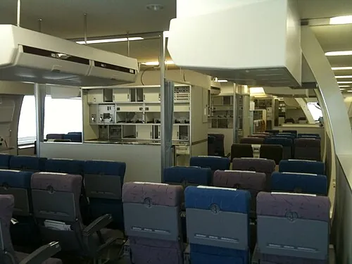 A cabin-service training facility with aircraft-style furnishings.