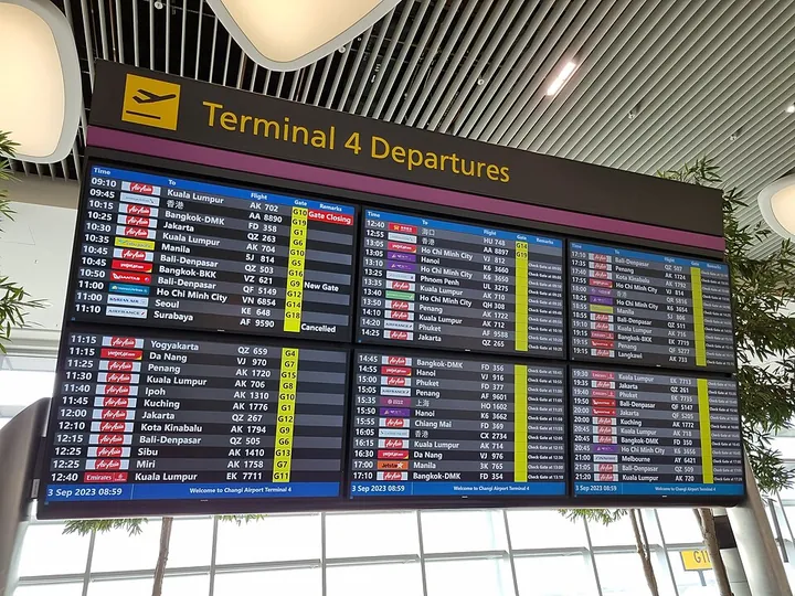 Flight-information screens in Terminal 4 at Singapore Changi Airport