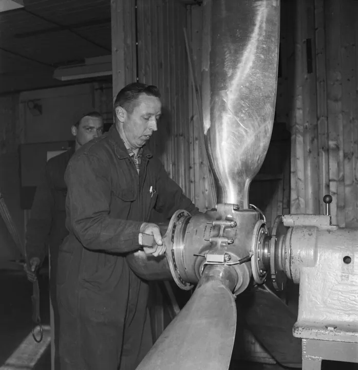 A technician works on a propeller in a Finnish workshop in the 1950s.