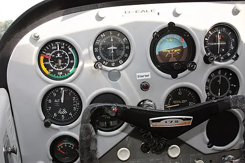 Pilot-side round instruments and control wheel in a Cessna 172.