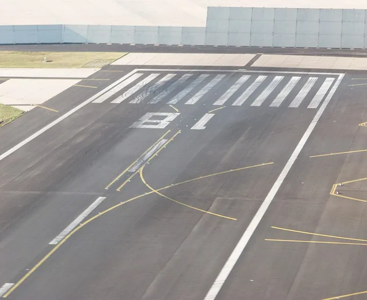The threshold and runway number at Frankfurt Airport