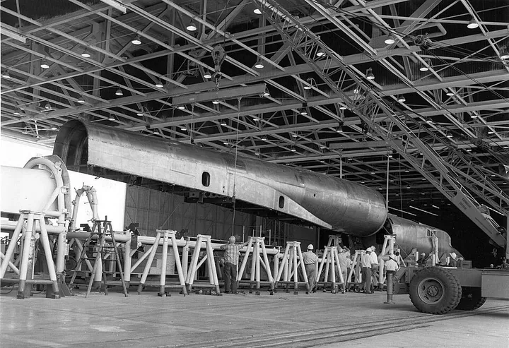 A forward fuselage section is assembled for the XB-70.