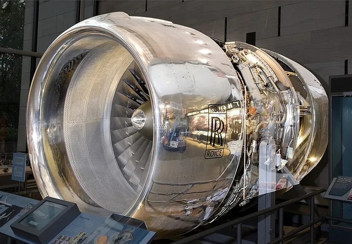 An RB211 turbofan exhibit exposes the fan and part of the engine installation.