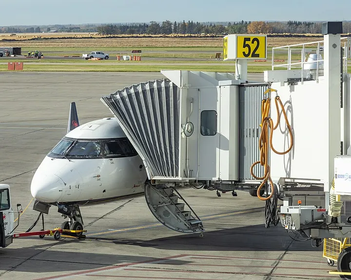A boarding bridge connected to an aircraft at Edmonton International Airport