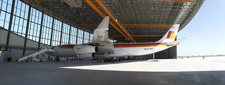 An Airbus A340 arrives in a new maintenance hangar.