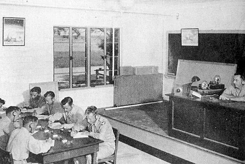 Rows of aviation cadets seated in a classroom at Bush Field.
