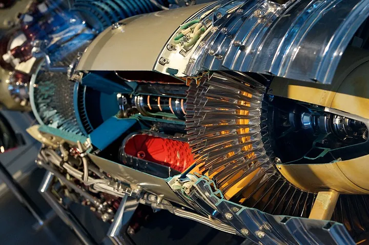 A cutaway Allison T56 exposes the inside of a turboprop engine.