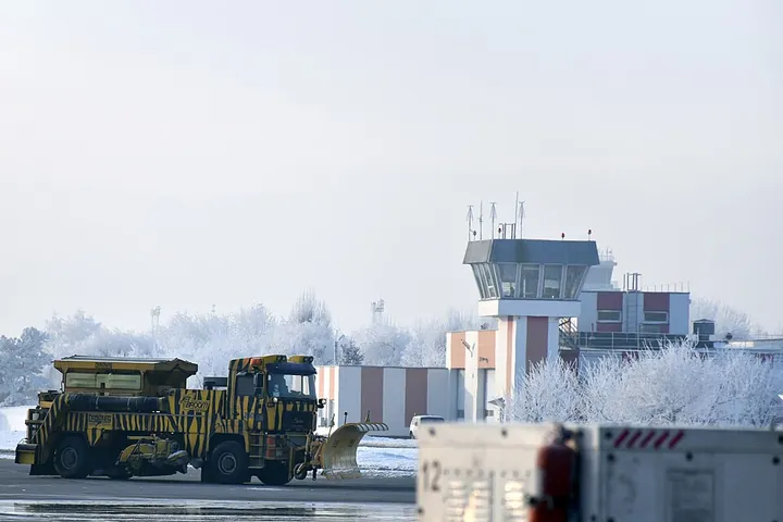 A runway sweeper passing the fire station at Boryspil Airport