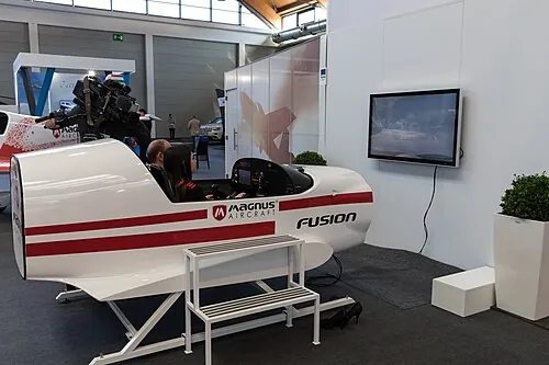 Magnus Fusion simulator displayed at an aviation exhibition.