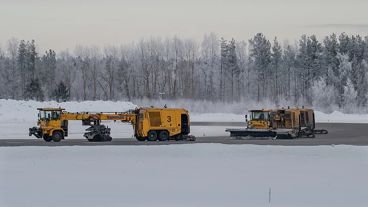 Runway snow removal at Oulu Airport in Finland