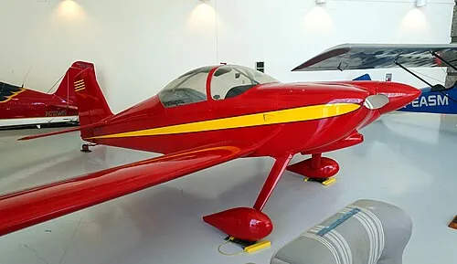 A Van's RV-6 aircraft displayed in a museum.