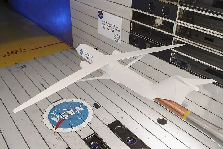 A research-aircraft model is tested in a wind tunnel for NASA's SUGAR project.